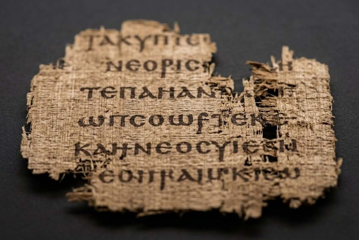 Ancient Coptic papyrus manuscript showing the opening lines of Acts of Peter and the Twelve from Nag Hammadi Codex VI