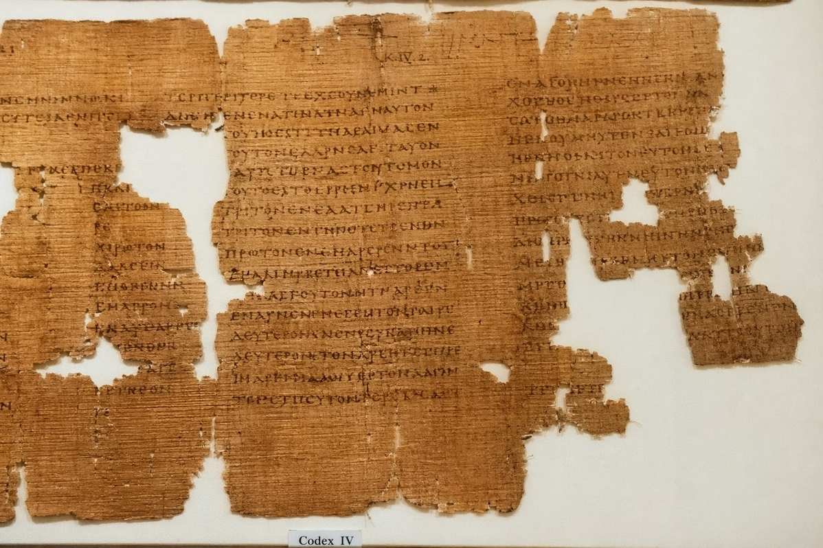 Ancient Coptic papyrus from Nag Hammadi Codex IV showing textual variants