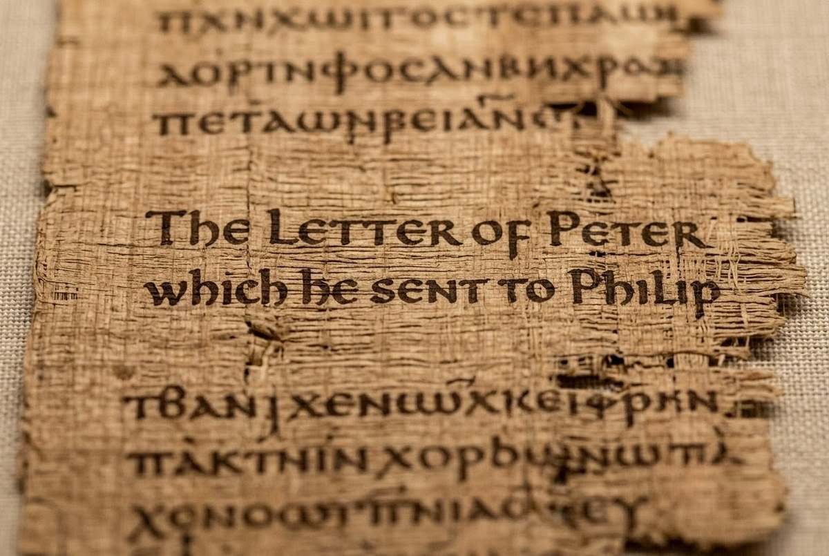 Ancient Coptic papyrus from Nag Hammadi Codex VIII showing the opening of the Letter of Peter to Philip