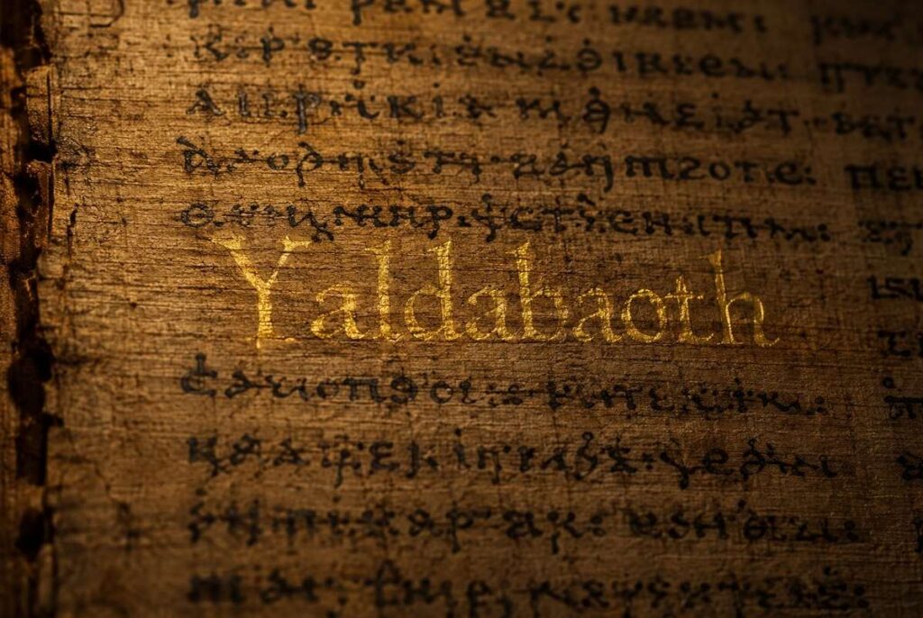 An ancient papyrus manuscript with the name Yaldabaoth illuminated in gold ink