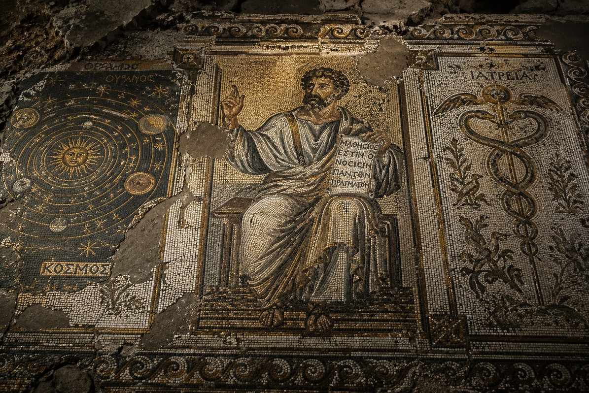Fragmented ancient mosaic depicting mystical teachers and celestial diagrams in Alexandrian style